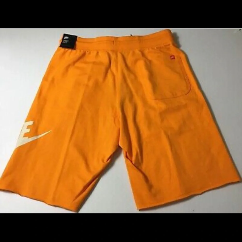 Nike Orange Men's Athletic Shorts with White Logo